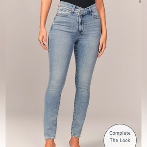Super skinny ankle high rise cross cross waistband curve love